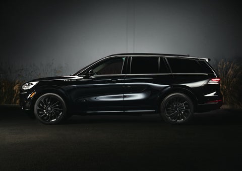 A 2024 Lincoln Aviator® SUV is shown in the Infinite Black exterior color | Lincoln Demo 4 in Derwood MD