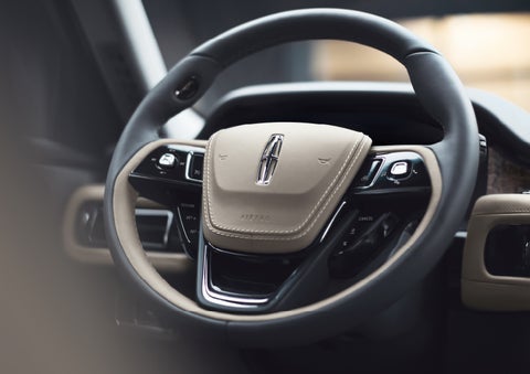 The intuitively placed controls of the steering wheel on a 2024 Lincoln Aviator® SUV | Lincoln Demo 4 in Wooster OH