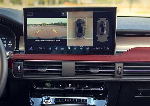 The driver of a 2024 Lincoln Corsair® SUV is shown selecting the drive mode. | Lincoln Demo 4 in Wooster OH