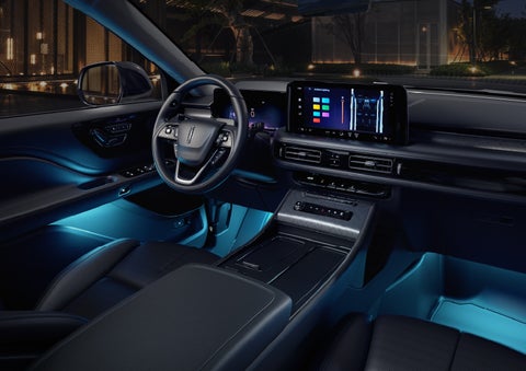 Deep blue Ambient Lighting glows from various places within a 2026 Lincoln Aviator® SUV. | Lincoln Demo 4 in Derwood MD